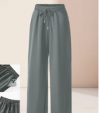 A Pair of Elegant Casual Long Pants for Women, Featuring a High-Waisted Design with a Solid Color And Lightweight Fabric,