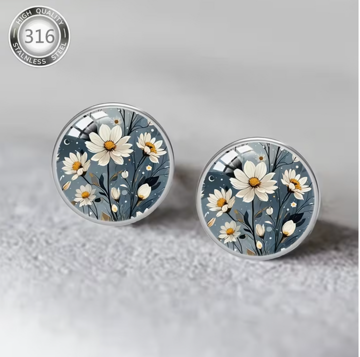 A Pair of 12Mm Vibrant And Natural Gray-White Daisy Design Earrings Made of 316 316 316 316 316 Stainless Steel, Featuring Hypoallergenic Materials And Embedded Convex Glass. Perfect for Everyday Outfits, Parties, And Vacation Wear