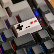 Retro Game Controller Shift Keycap - Artistic Mechanical Keyboard Design, Directional Keys, Classic Game Console Style, Made From Durable PLA Material, Compatible With Mechanical Keyboards, Ideal For Gamers And Collectors.